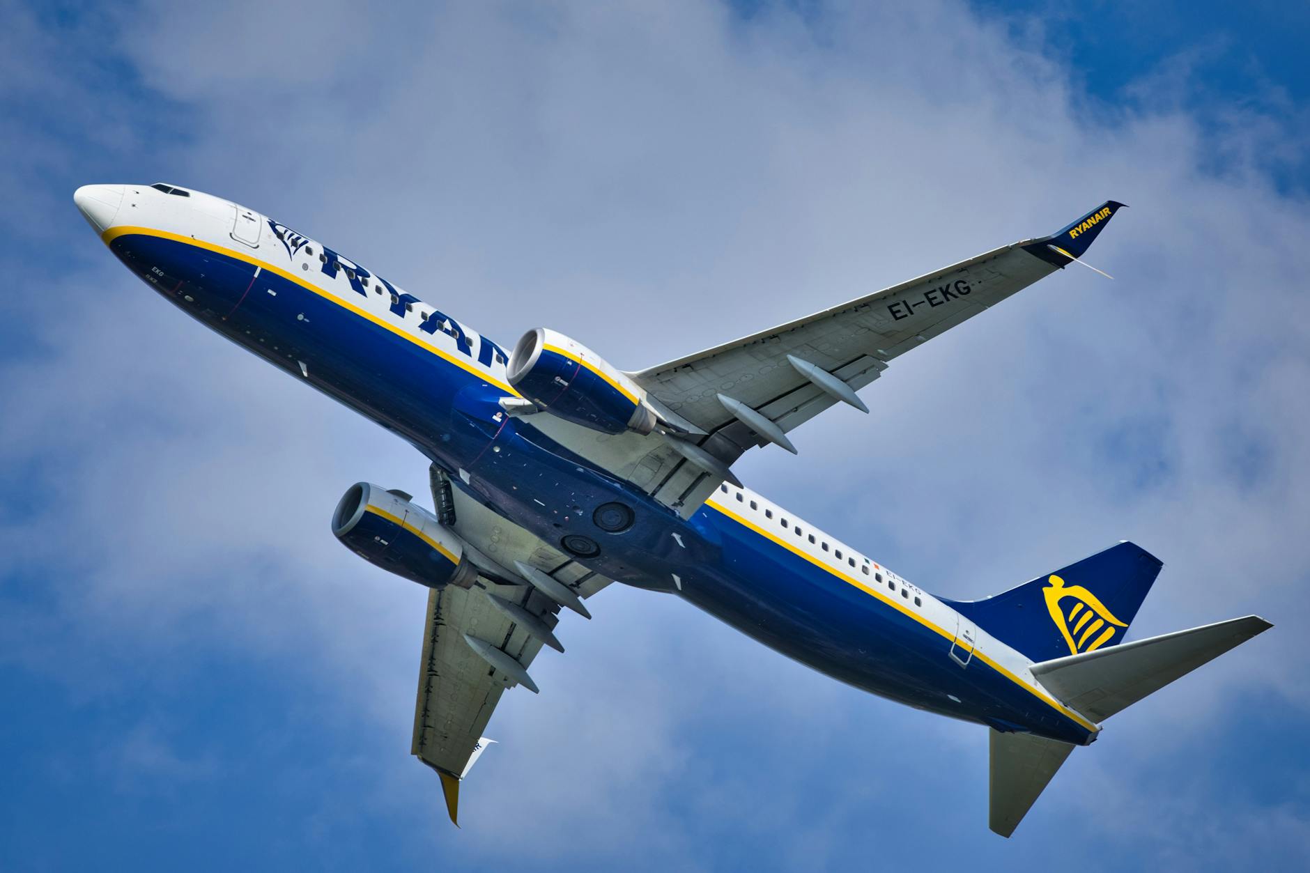 dynamic shot of passenger airplane in flight